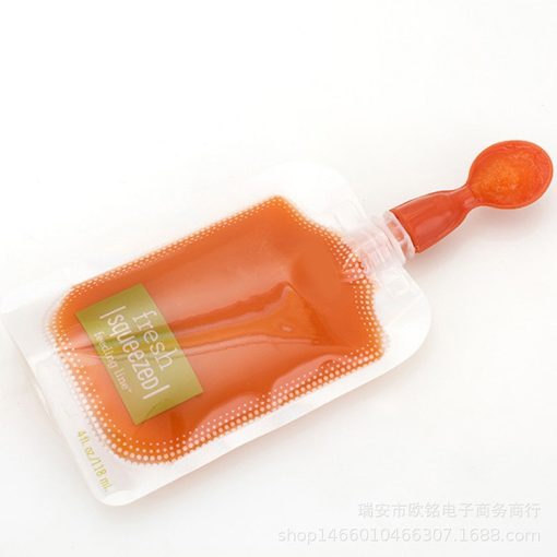 Baby Food Squeeze Station Pouch Feeling into Reusable pouches.